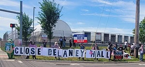 Peaceful protesters gather outside Delaney Hall in Newark on a Sunday afternoon