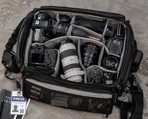 Camera bag and photography equipment belonging to a photojournalist detained outside Delaney Hall